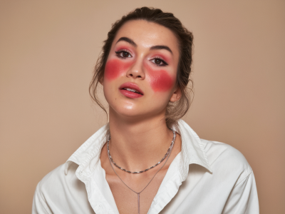 Which affordable sunscreen actually prevents flushed cheeks under makeup?